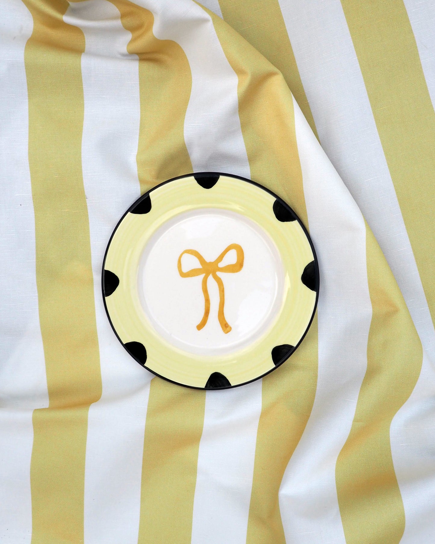 Teller BOW gelb Bild 1