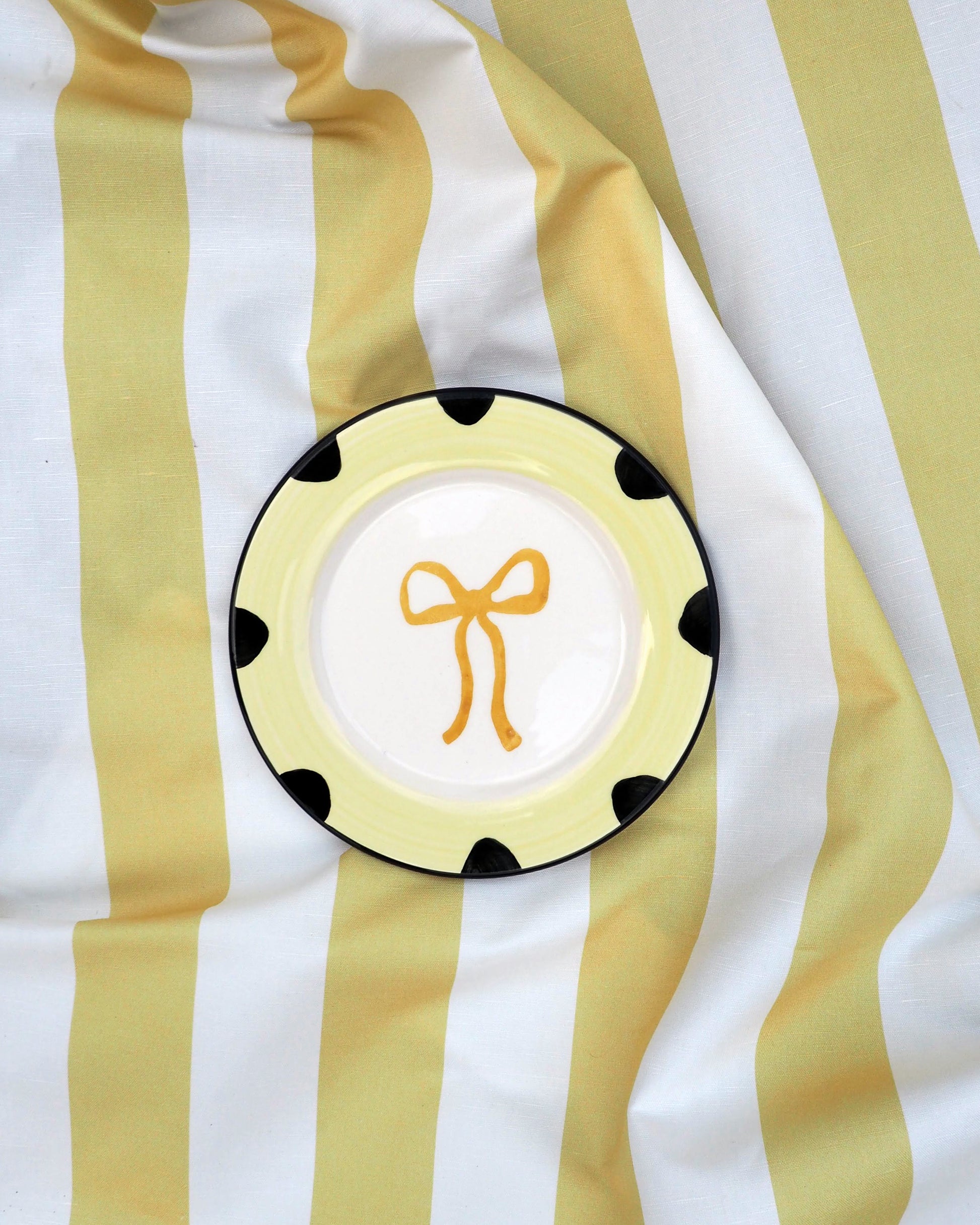 Teller BOW gelb Bild 1